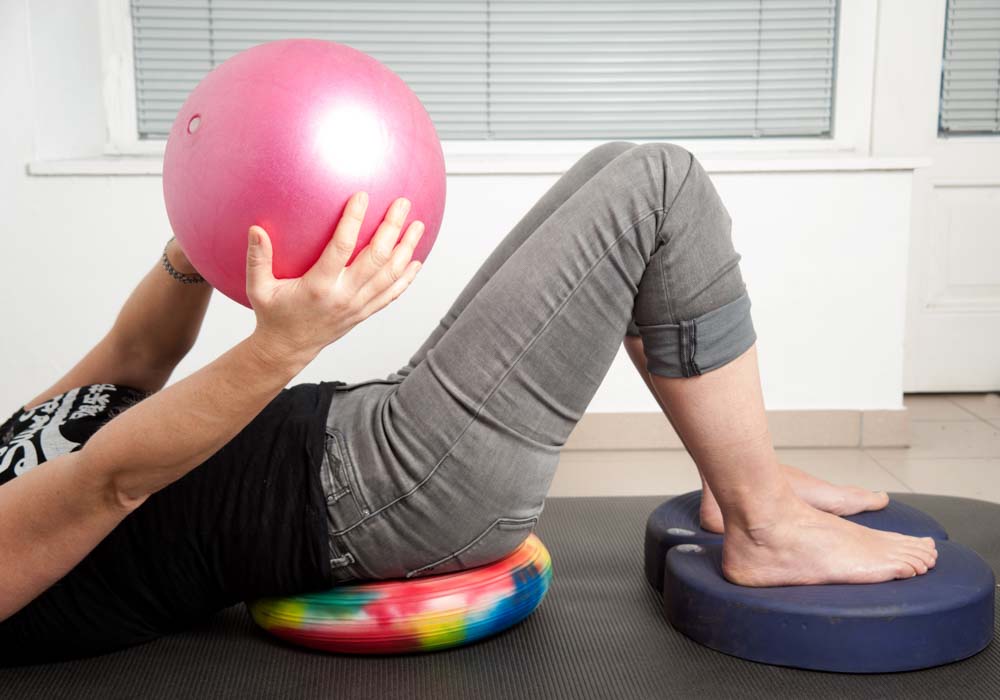 Balancetraining im Liegen, Neurophysio-Gust